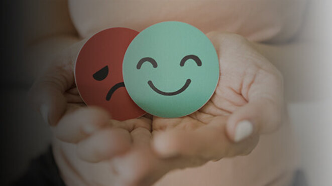 Middle age woman hands holding sad face hiding behind happy face, bipolar and depression, mental health, midlife crisis concept