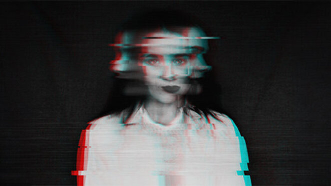 black and white blurred abstract portrait of a girl with mental disorders and schizophrenia with a glitch effect