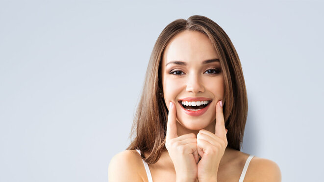 Young woman smiling brightly