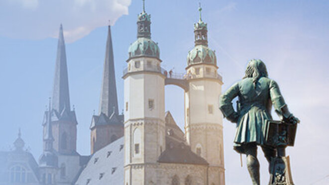 Halle an der Saale with the Georg Friedrich Händel monument on the market square and the towers of the Marktkirche.