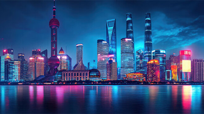 Vibrant night skyline of shanghai with iconic skyscrapers reflecting on huangpu river