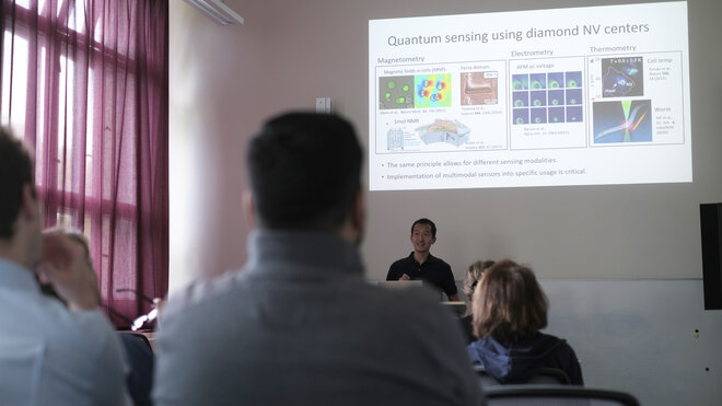 Masazumi Fujiwara giving his talk