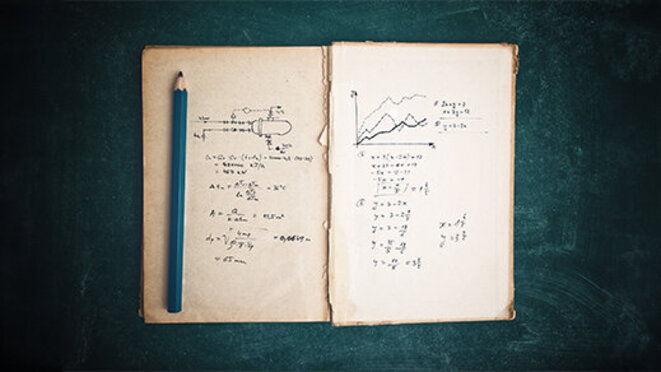 Note book with thermodynamics calculations written by hand